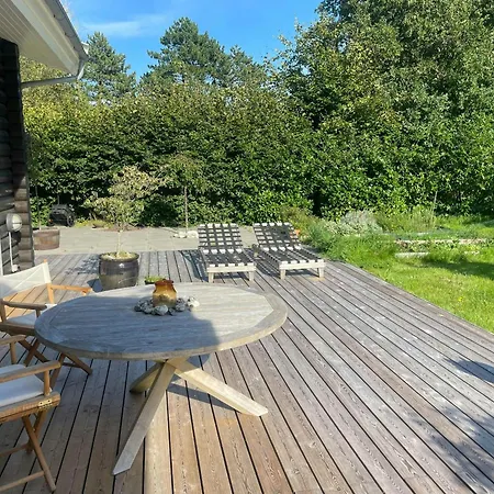 Log Near With Garden Shelter